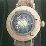 Wrist-watch decorated with VW Beetles.