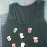 Self made T-Shirt with several little Beetles made out of plastic.