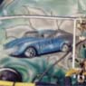 A VW Beetle decorating his own motor.